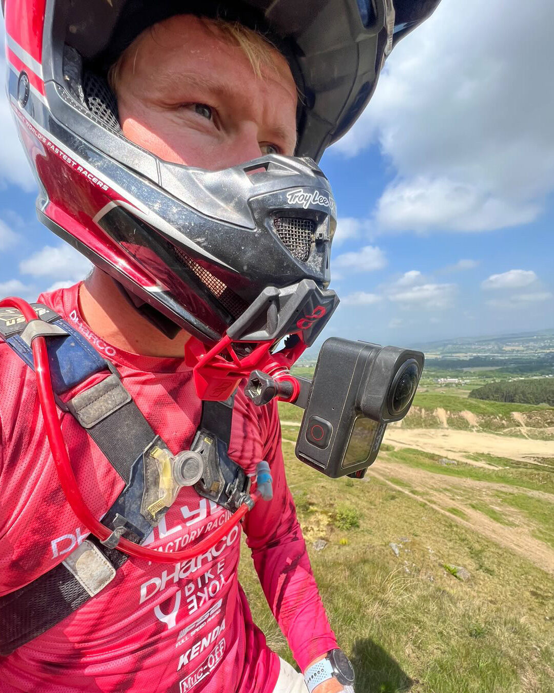 Motorcycle rider using a Dango L Bracket for vertical action camera filming